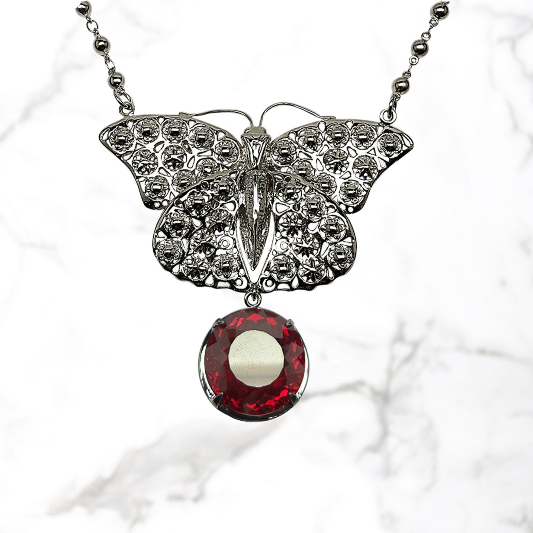 M2 butterfly pendant necklace