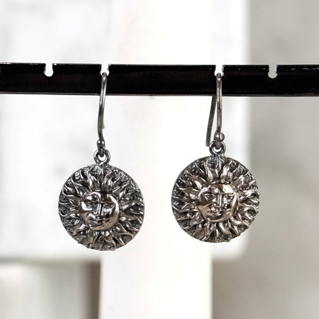 The Madstone sun-moon earrings