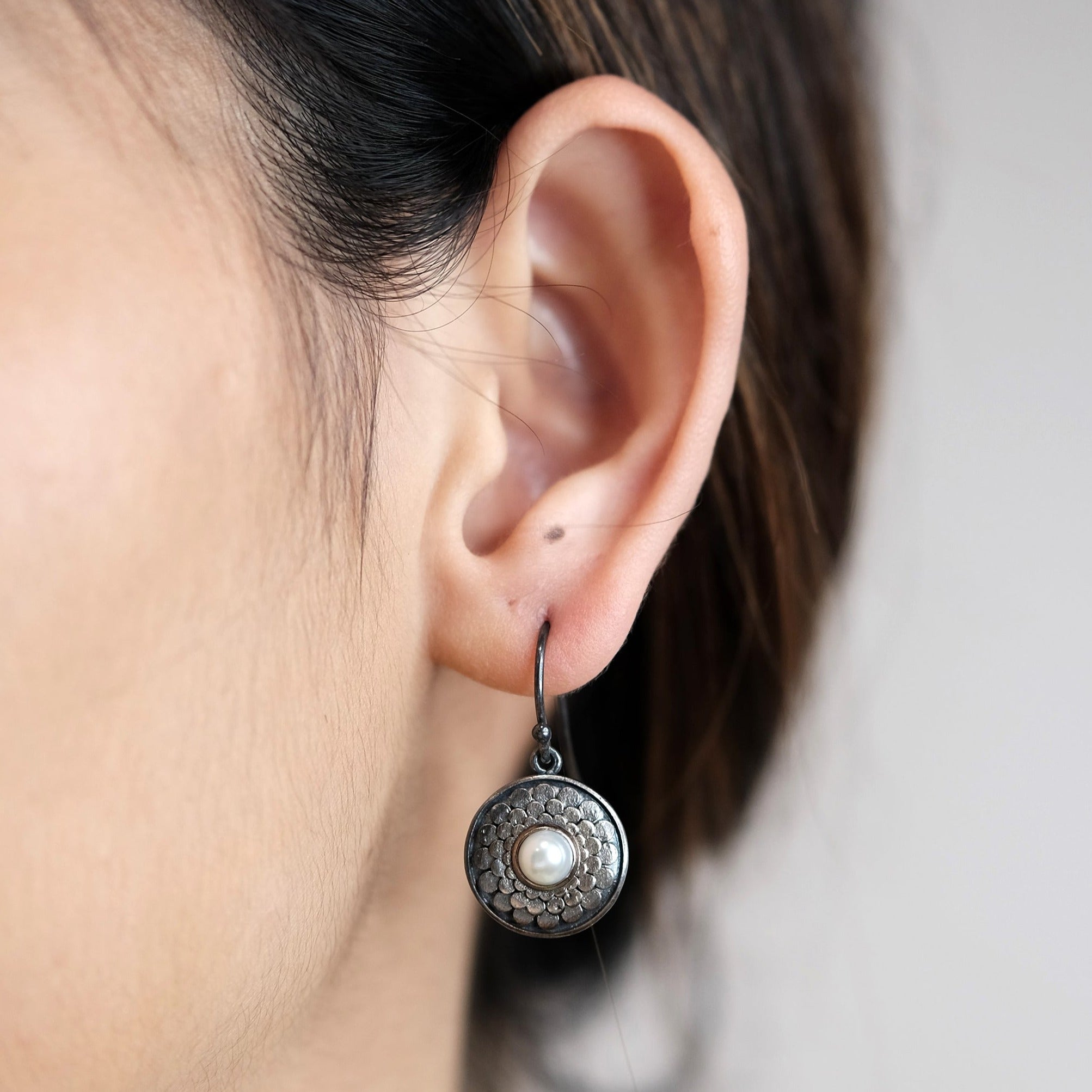 The Madstone shield earrings
