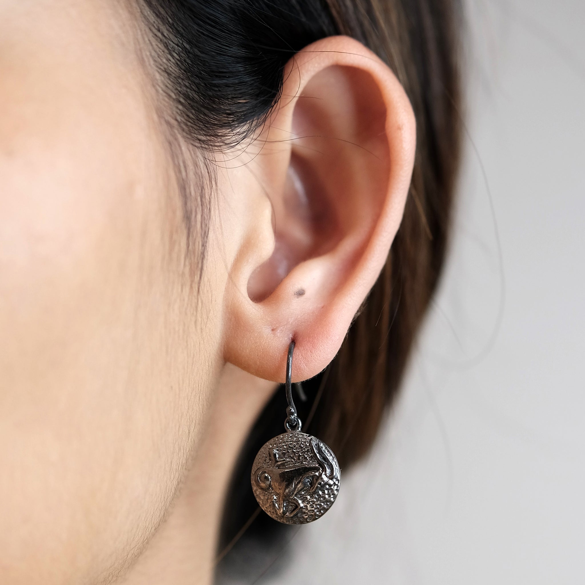 Capricorn drop earrings
