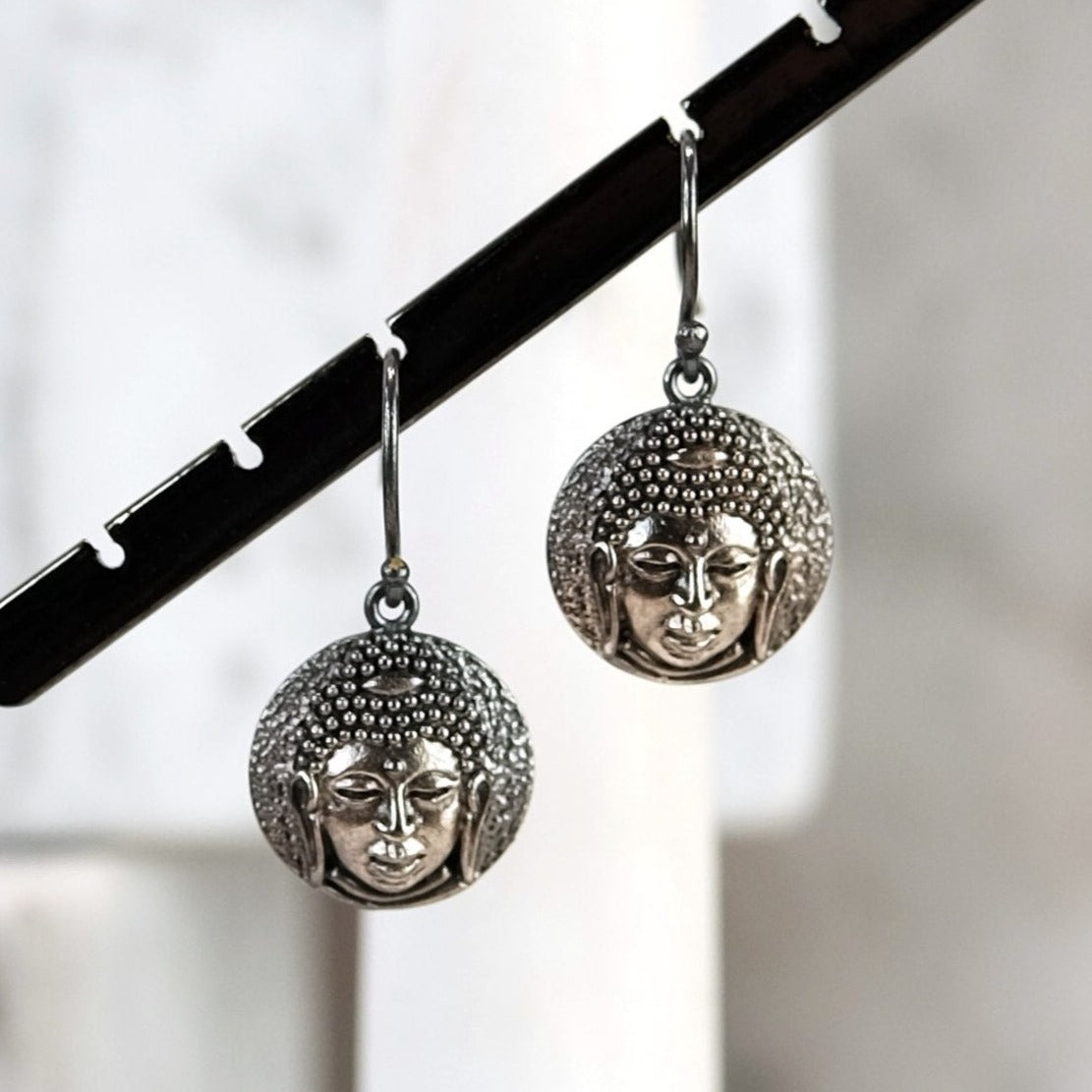 The Madstone buddha earrings