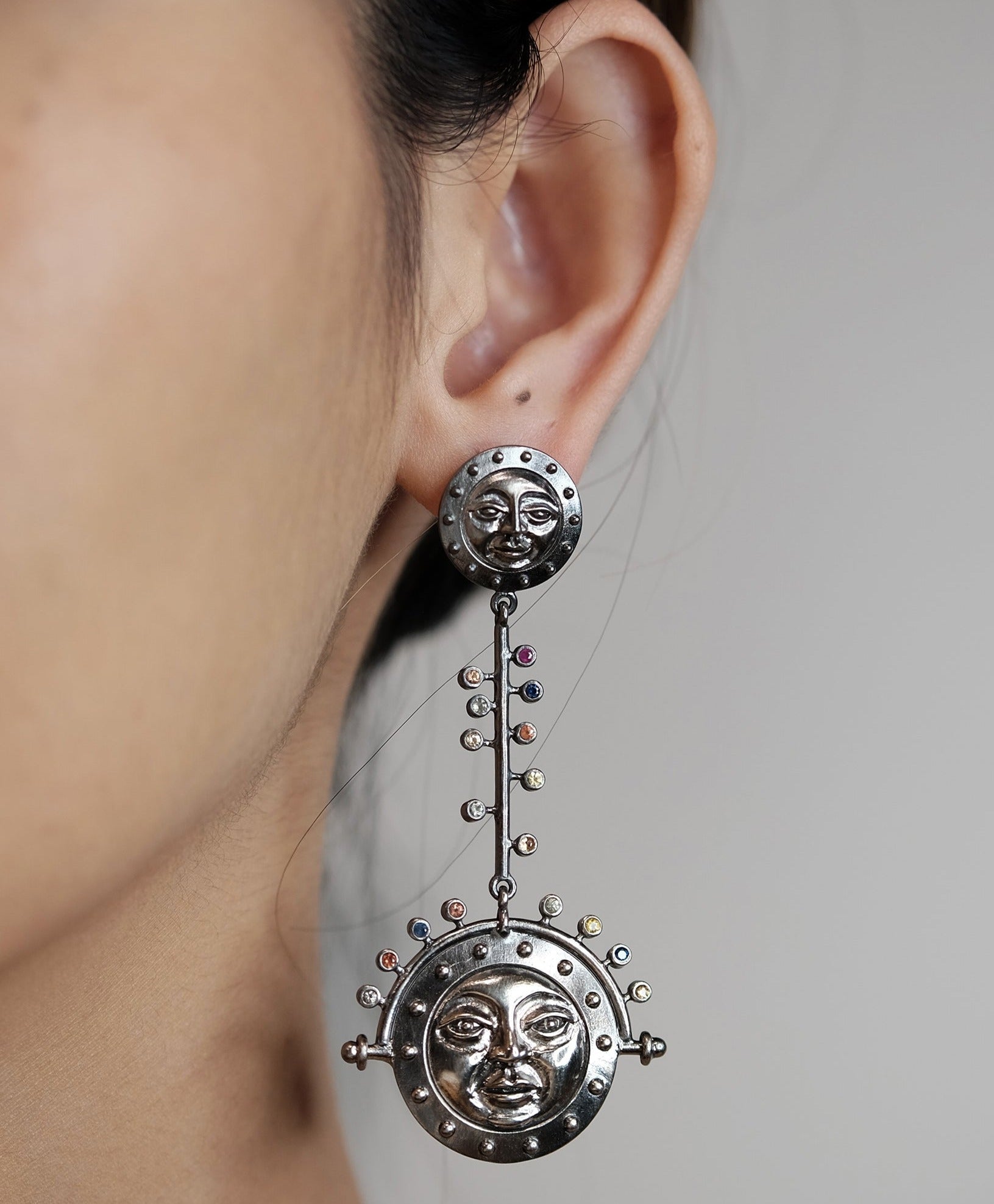 The Madstone moonface earrings