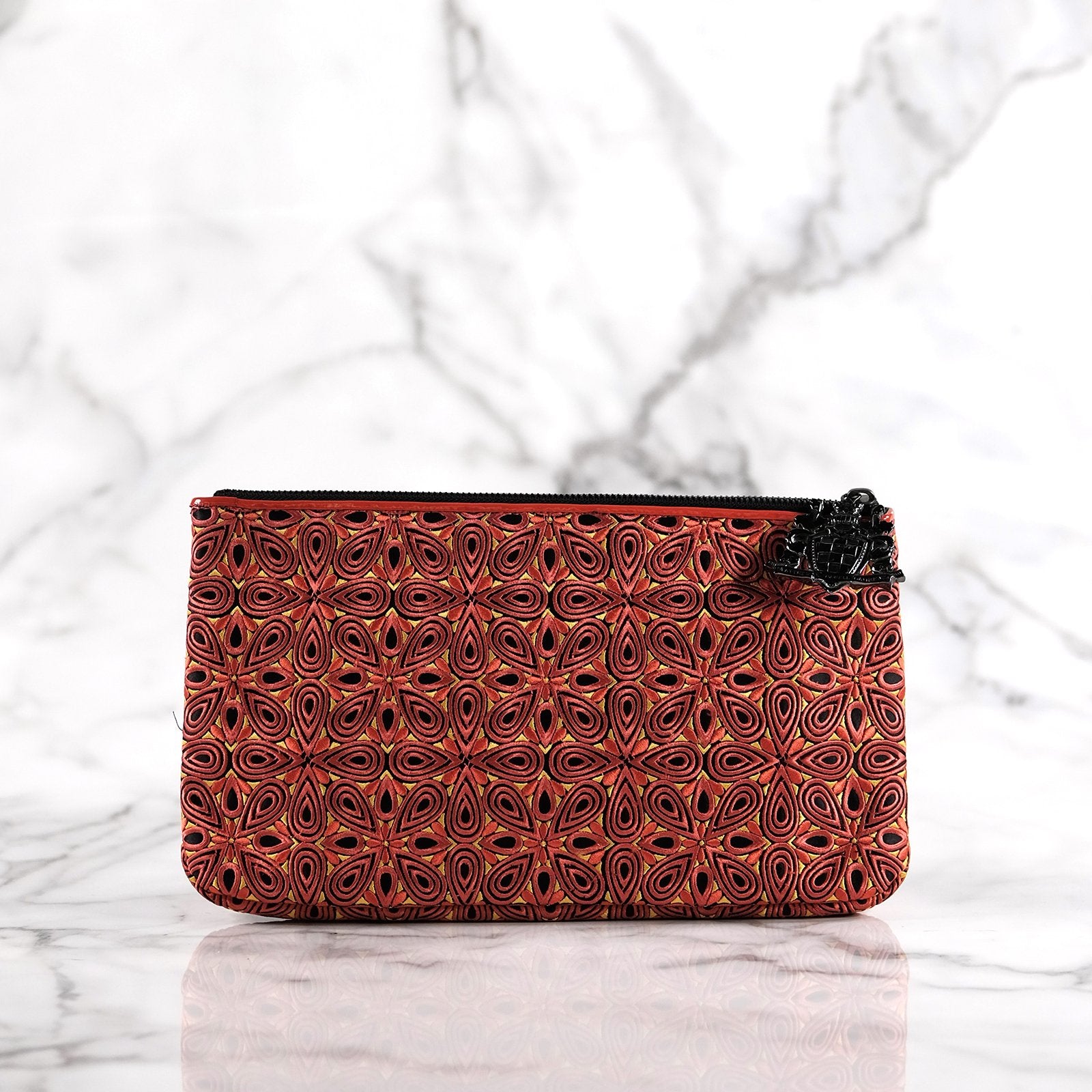 Trysta red petal patterned embroidered satin handbag