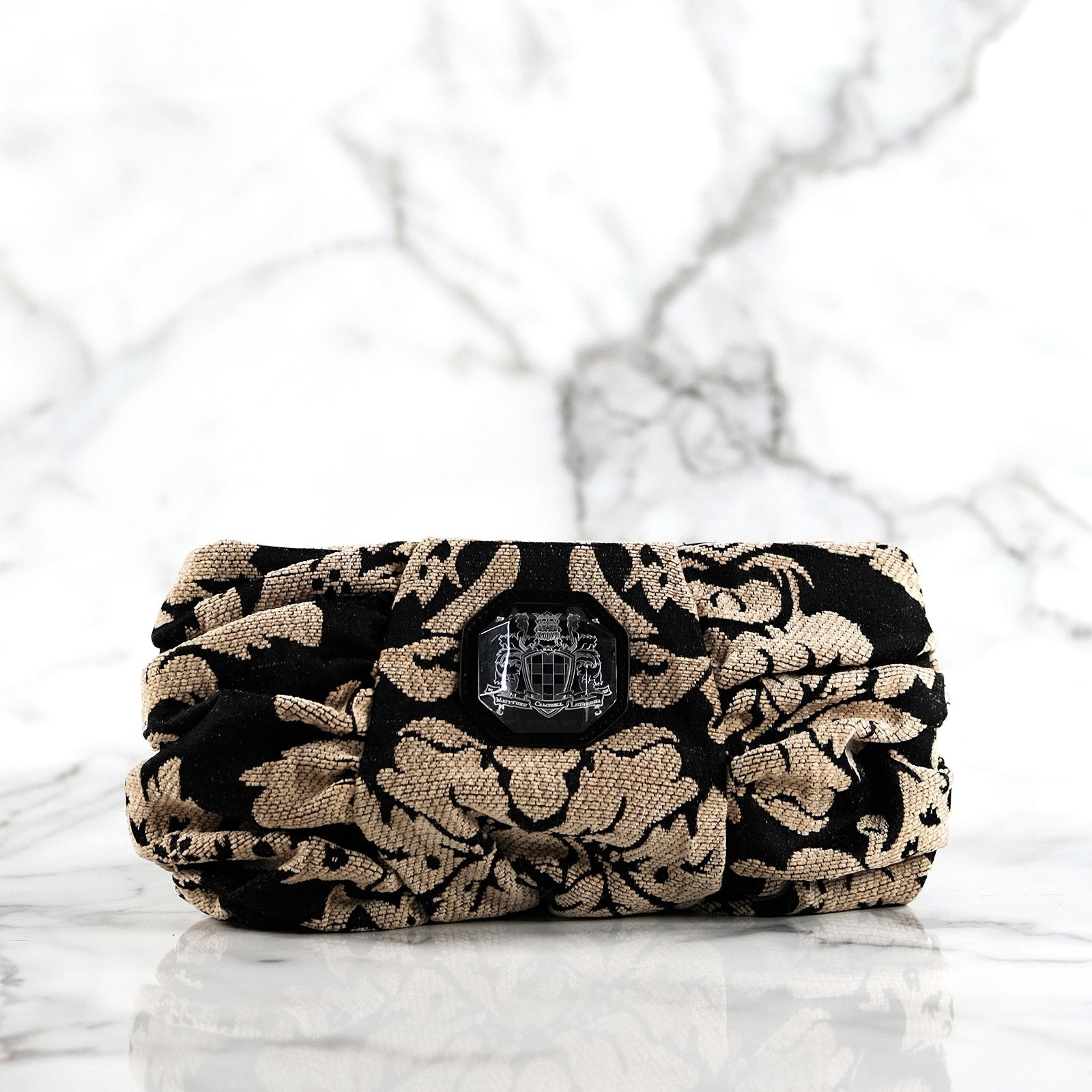 Athena black and beige tapestry inspired suede clutch